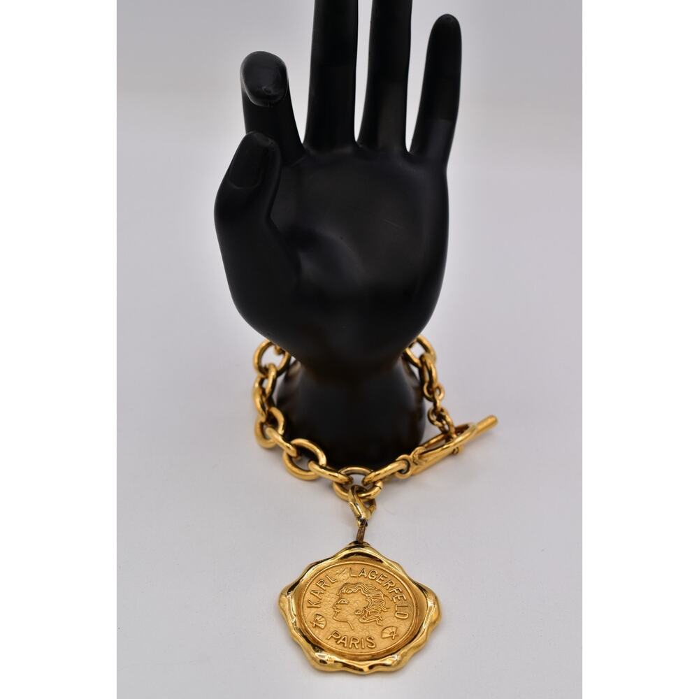 Karl Lagerfeld Vintage Logo Charm Bracelet Seal Medallion Paris Gold Runway Bin5 - Picture 2 of 12